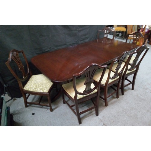 478 - A Dining Table in Two Halves with a leaf each and Six Chairs with Carving Details. 75cm H x 218cm Ex... 