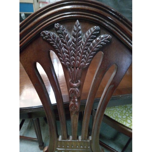 478 - A Dining Table in Two Halves with a leaf each and Six Chairs with Carving Details. 75cm H x 218cm Ex... 