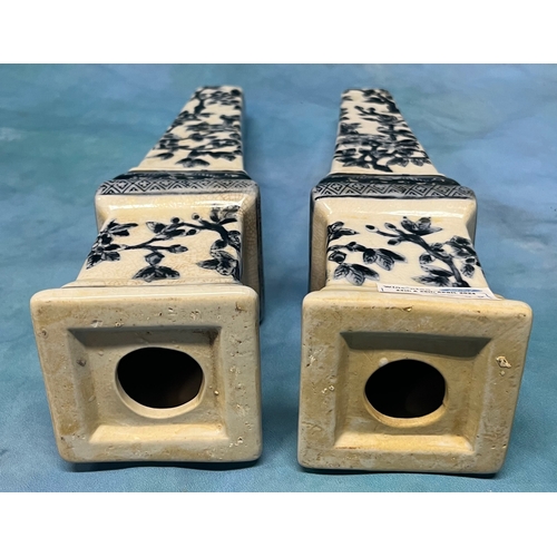 530 - Pair of decorative ceramic obelisks