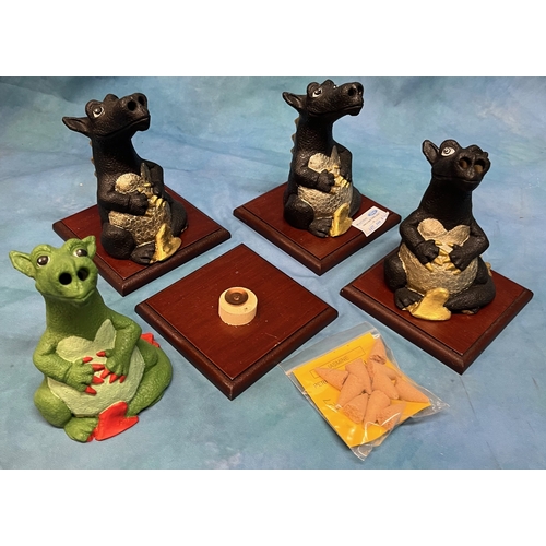 546 - 4x Handmade Dragons lair incense burner ornaments on wooden plinths (includes incense)