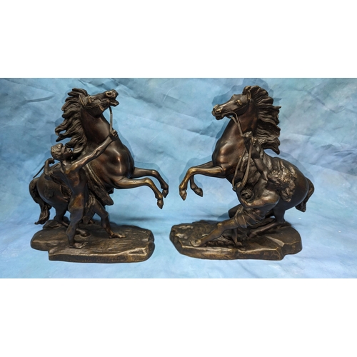 67 - A pair of opposing Bronze Marley Horses