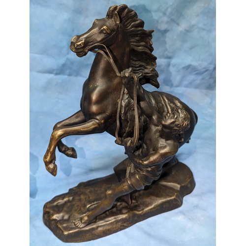 67 - A pair of opposing Bronze Marley Horses