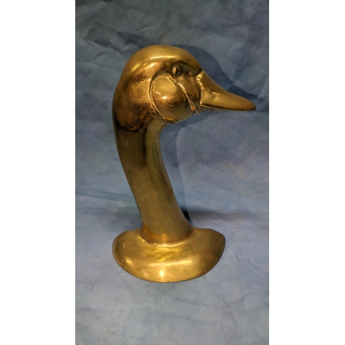 76 - A brass Duck head doorstop - 13 x 18 x 9cm