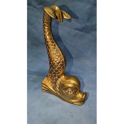 77 - A brass Dolphin doorstop - 26cm tall