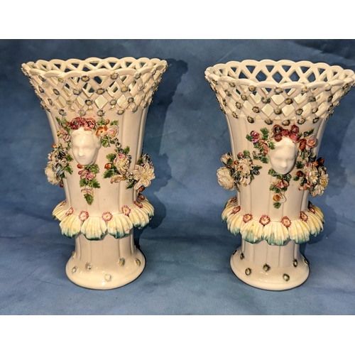 83 - A pair of Denby frill vases (slight loss to shell rim on one, and repair to top rim on fretwork as p... 