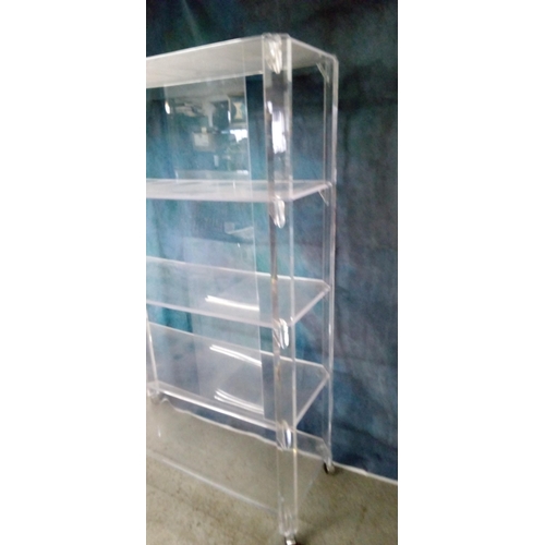 617 - A  Akiko Perspex Shelving Unit with Five Shelves with Wheels. 182cm H x 124cm W x 46cm D.