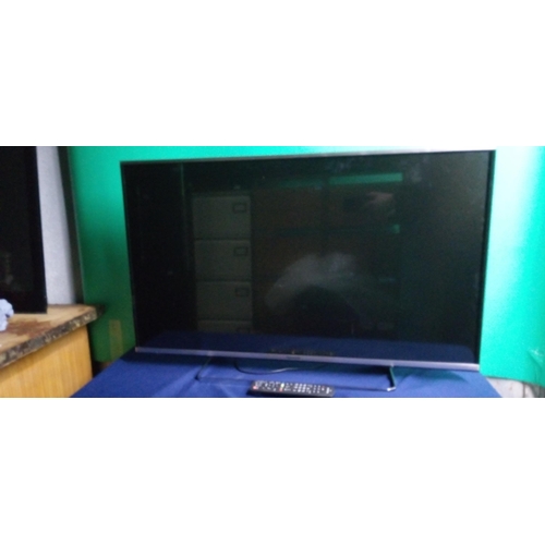 861 - A 42 inch Panasonic TV, on stand with remote - Model NOTX-42A565OB