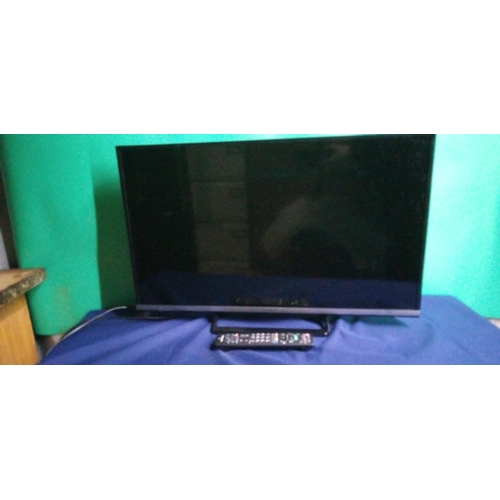 866 - Panasonic 32inch TV, on stand with remote - Model TX-32CS510B