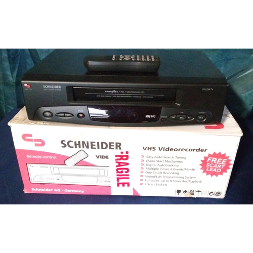 876 - Schneider Video Plus VHS player with remote and instructions in original box