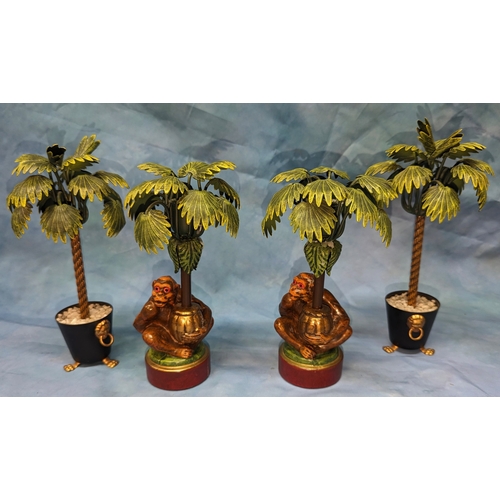 103 - A pair of metal monkey candlesticks and table ornaments - 22cm tall.