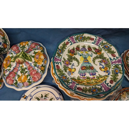 108 - A large quantity of China plates, bowls and dinner service from Skyros, Greece.