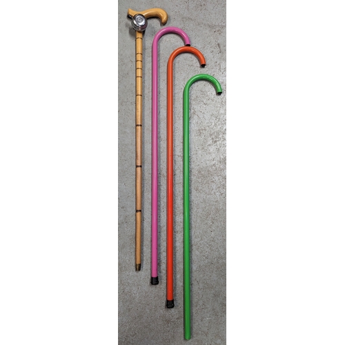 331 - A Walking Stick with a Bell and 3 x Coloured Metal Walking Sticks