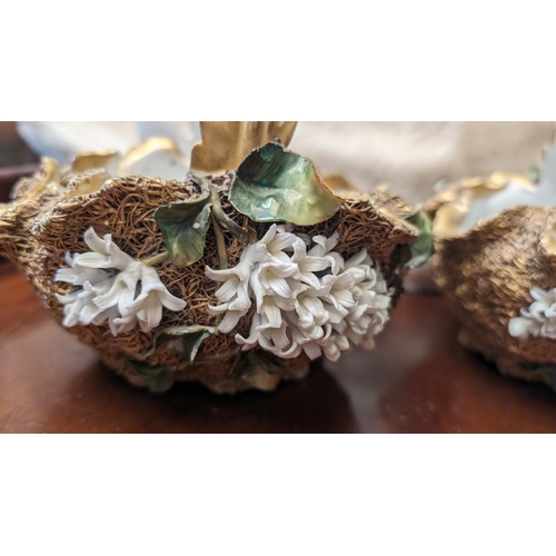 227 - A pair of hand painted antique porcelain baskets with jasmine flower decoration, on weaved gold back... 