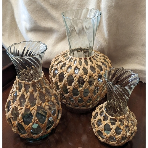 230 - Set of 3 Wicker Covered Glass Vases in Graduating Sizes