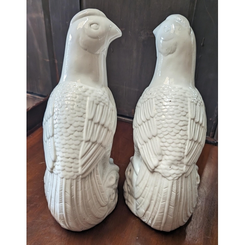 566 - 2x White porcelain opposing sides china bird ornaments - hollow inside - 32cm high