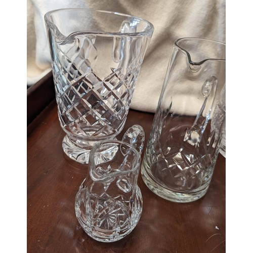 570 - 3 x Crystal Jugs and a Small Creamer