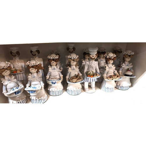 609 - A Collection of 14 x Laura Dunn Pottery Figurines