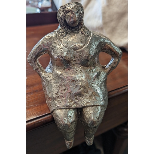 610 - A Voluptuous Lady Metal Mantle Ornament with Signature