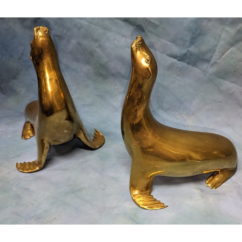 75 - A pair of Brass Seal Door Stops - 25 x 30 x 24cm