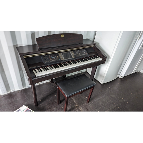 357 - A Yamaha CVP-207 Clavanova and Stool with Accessories