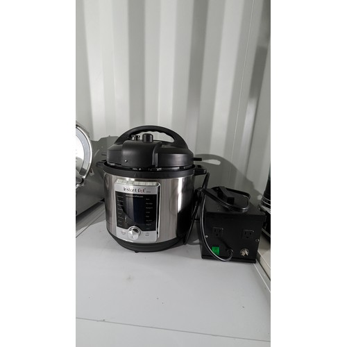 819 - An Instant Pot Ultra - Pressure Cooker with Transformer