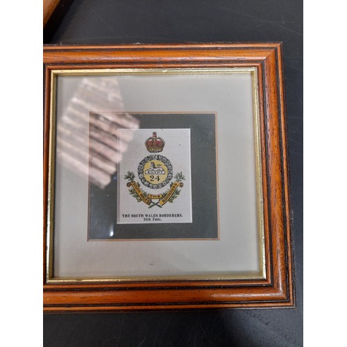 651 - A Collection of Military Plaques and Framed Military Embroideries.