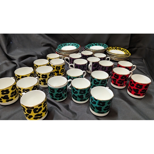 239 - Enzart Designs Leopard Print Coffee Cups and Saucers - 8 x Yellow, 3 x Red, 6 x Purple and 4 x Green... 