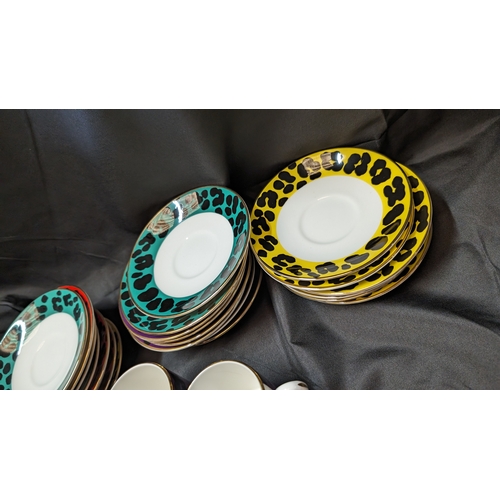 239 - Enzart Designs Leopard Print Coffee Cups and Saucers - 8 x Yellow, 3 x Red, 6 x Purple and 4 x Green... 