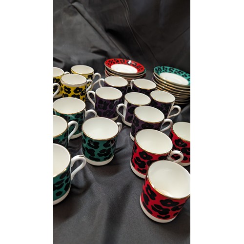 239 - Enzart Designs Leopard Print Coffee Cups and Saucers - 8 x Yellow, 3 x Red, 6 x Purple and 4 x Green... 