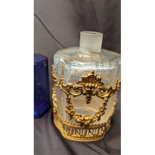 258 - 6 x Antique Perfume Bottles inc. Large brass Overlaid Bottle - no stooper and slight chip to rim