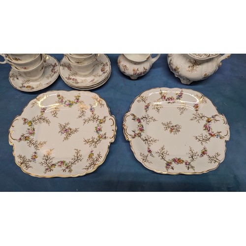 168 - An Antique Part Floral Chintz Tea Service