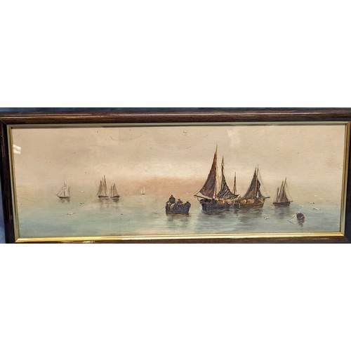 785 - A pair of matching framed coastal scenes - Largest 64 x 27cm in frame