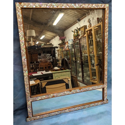 156 - A mother of pearl faced mirror with embroidered backing - 61 x 76cm