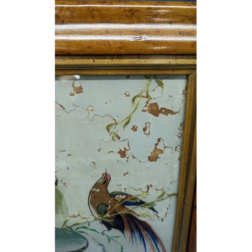 734 - A painting on glass of a fountain with peacocks and flowers - some deterioration as pictured - 55 x ... 