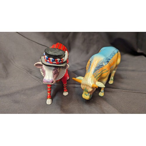 257 - Cowparade Ornaments x 2 ( Beefeater missing horn)