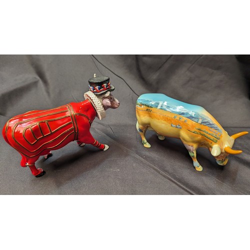 257 - Cowparade Ornaments x 2 ( Beefeater missing horn)