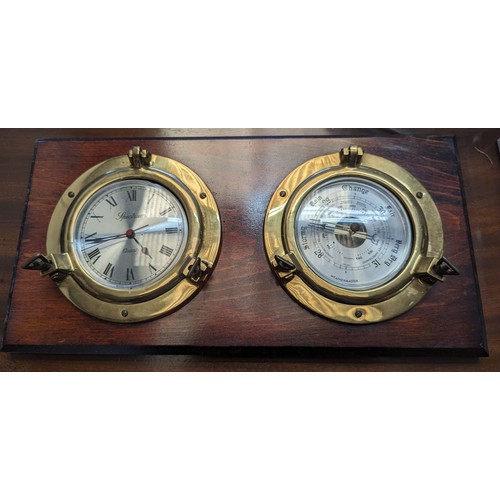 660 - A Brass Ships Clock and Barometer Set