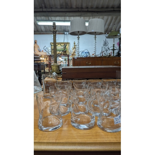 616 - A large quantity of 'Twisted' Glass tumblers and Highball glasses.