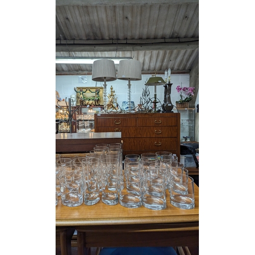 616 - A large quantity of 'Twisted' Glass tumblers and Highball glasses.