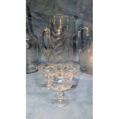 637 - An Assortment of Engraved and Etched Glassware