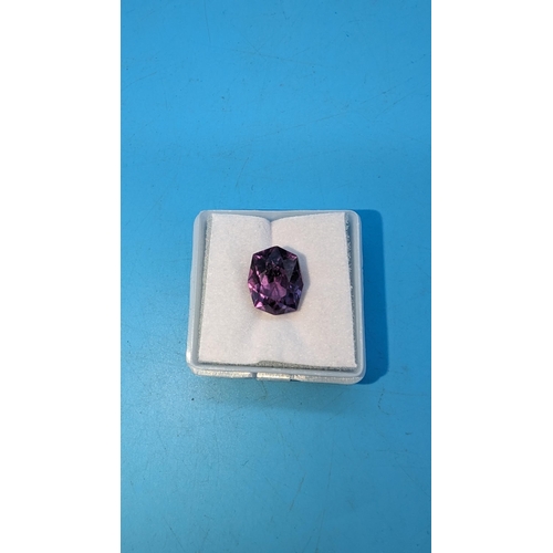 425 - A 10.8ct Hexagonal Colour Changing Sapphire.