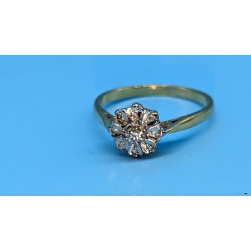 206 - An 18ct Gold and Diamond Daisy Illusion Ring.