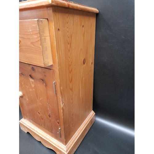 1127 - A Pine Bedside Cabinet with One Drawer and Slight Damage as Pictured.