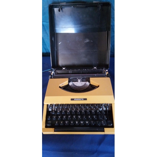 1045 - A vintage Silverette portable typewriter