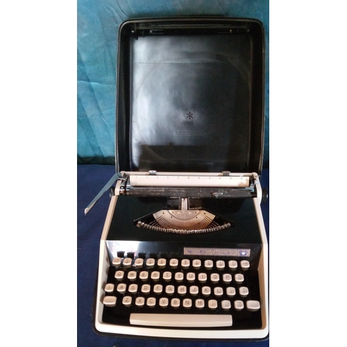 1046 - A vintage Monarch 2 typewriter