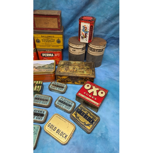 1134 - An assortment of antique and vintage tins. OXO, Players etc.