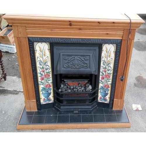 539 - Sun crest electric coal effect fire with floral tile and cast iron effect surround with pine mantle ... 