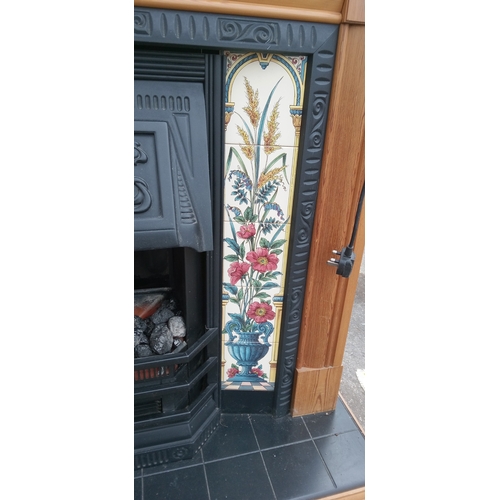 539 - Sun crest electric coal effect fire with floral tile and cast iron effect surround with pine mantle ... 