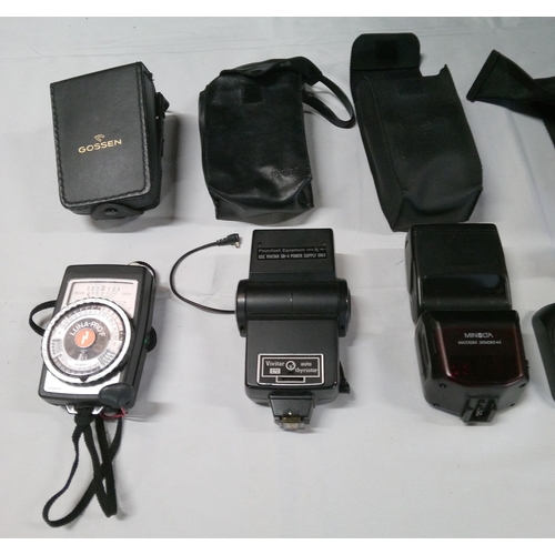 831 - A selection of cameras and accessories including: 
1x Minolta Maxxum 7000 Film Camera; 1x Minolta Ma... 