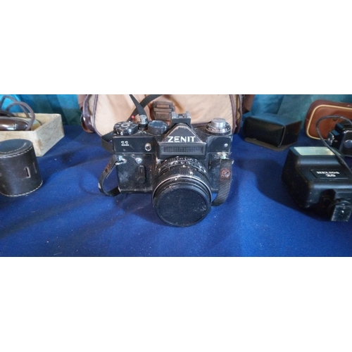 1097 - A Zenit 11 SLR Camera and accessories